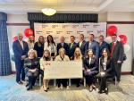 Representatives from KeyBank and Albany Medical Center shown with a $1 Million grant check.